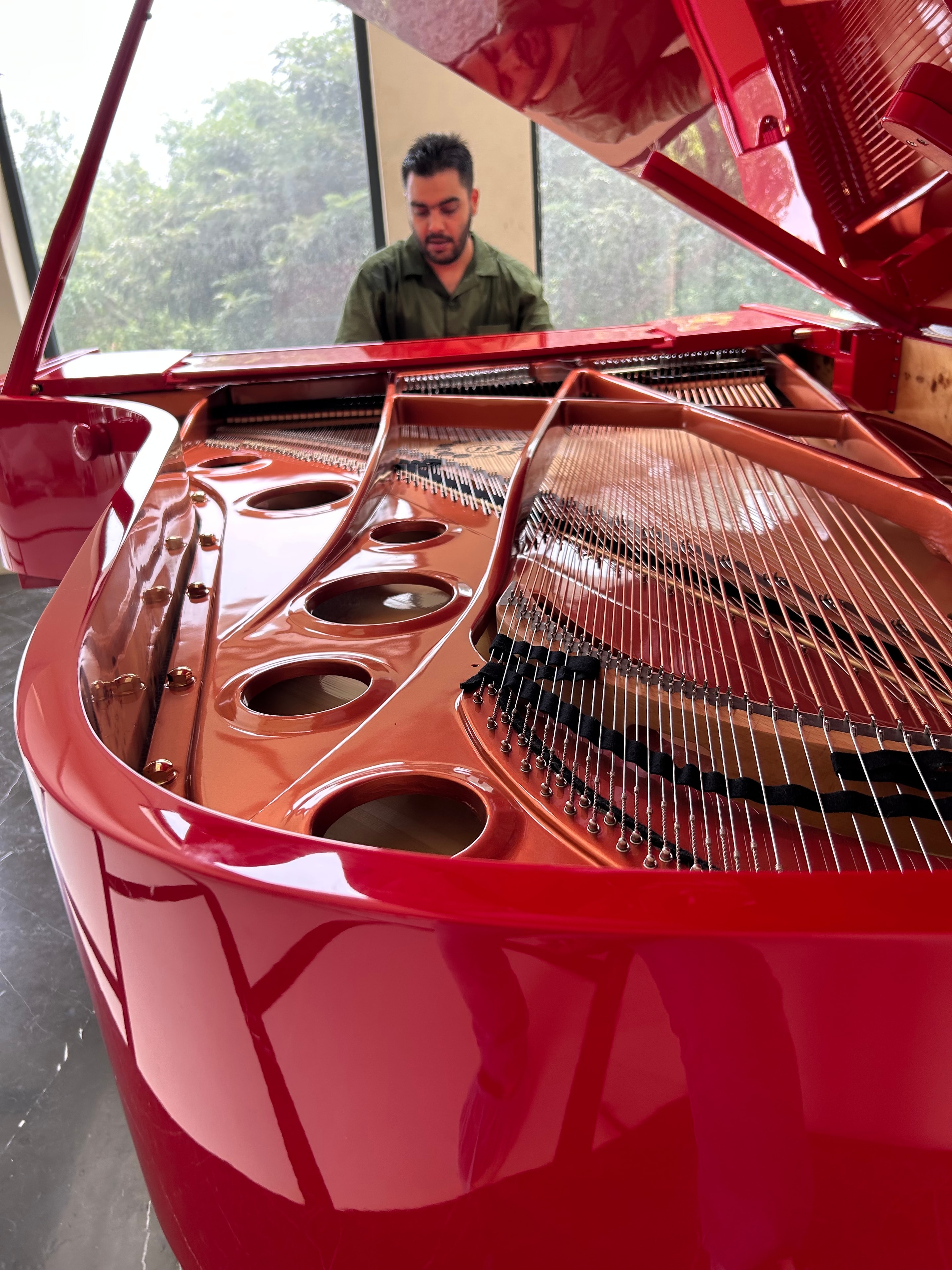 Mayank Gill performing at grand piano